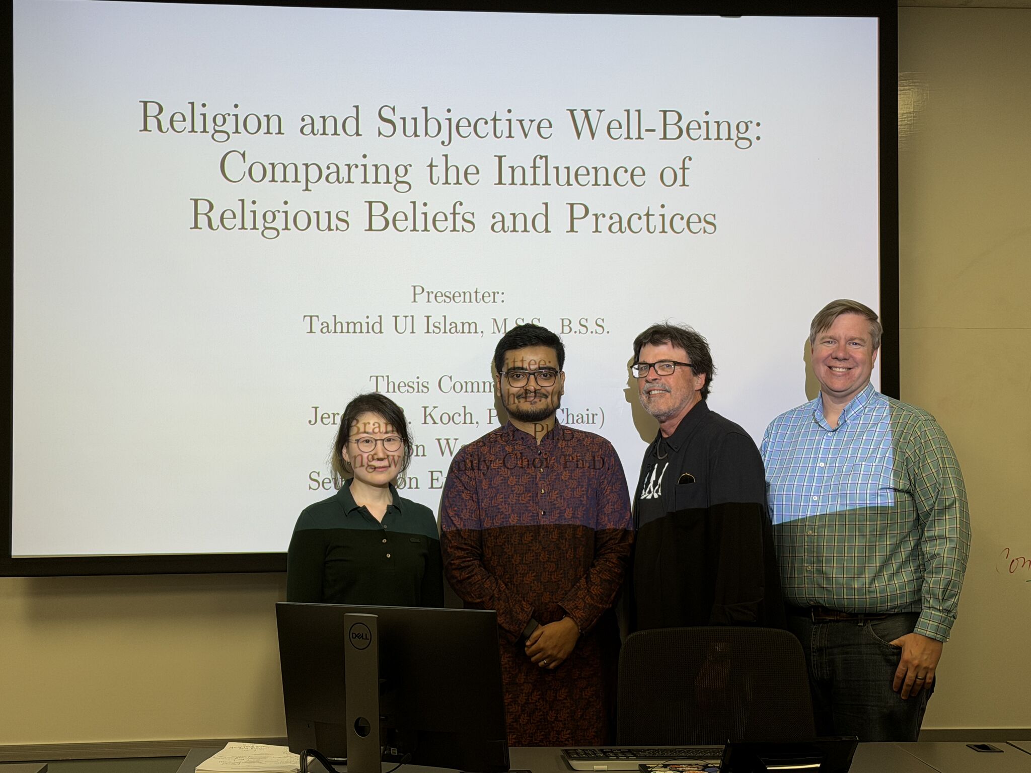 Tahmid Ul Islam with his Master of Arts thesis committee after his thesis defense