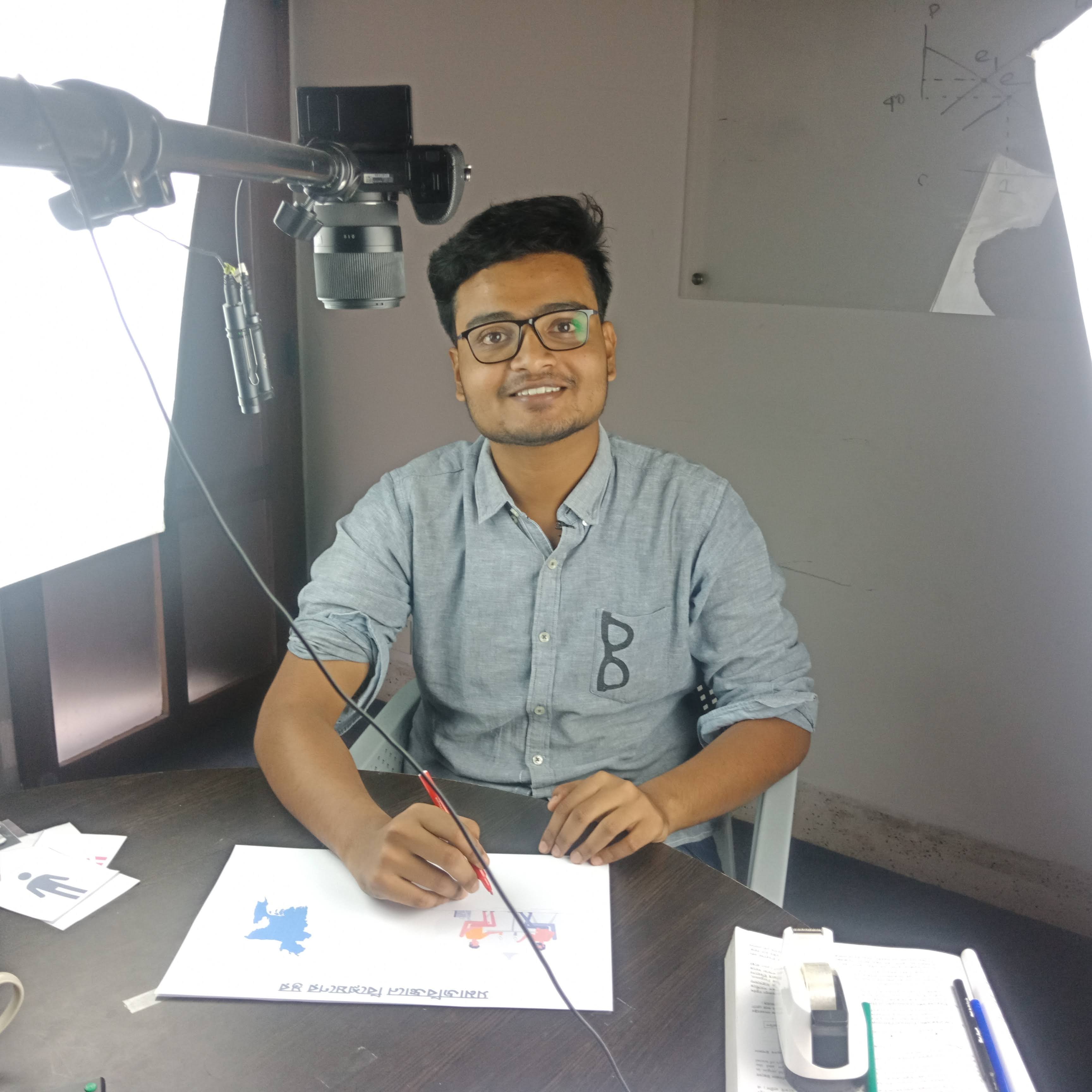 Tahmid Ul Islam recording educational videos for 10 Minute School